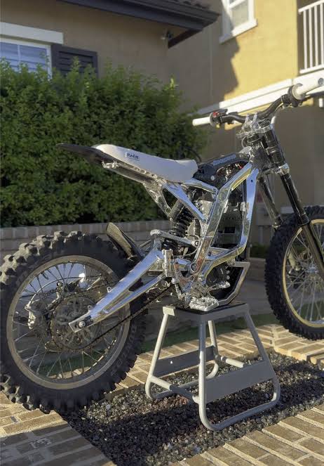 Polished electric dirt bike frame